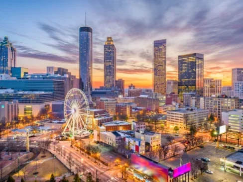 Atlanta's skyline at sunset, with ferris wheel visible