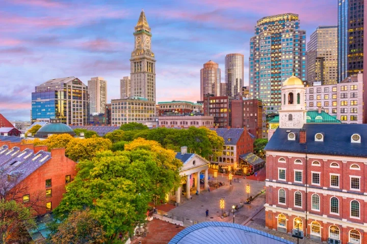 Boston, Massachusetts, USA skyline with Faneuil Hall and Quincy Market at sunset