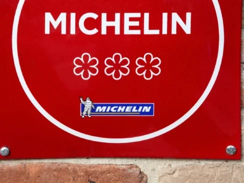 Michelin restaurant 3 stars symbol on a wall