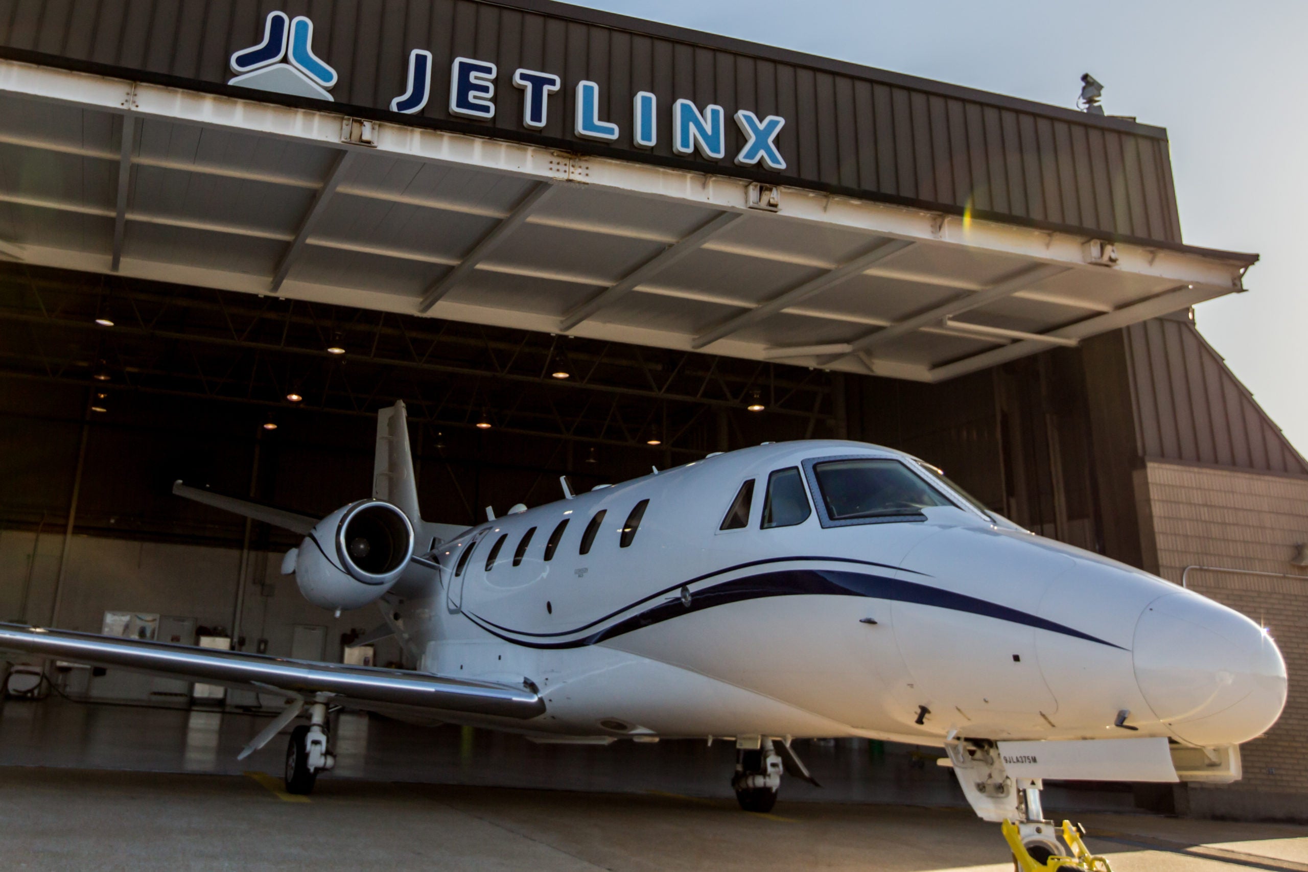 jetlinx company jet in hangar