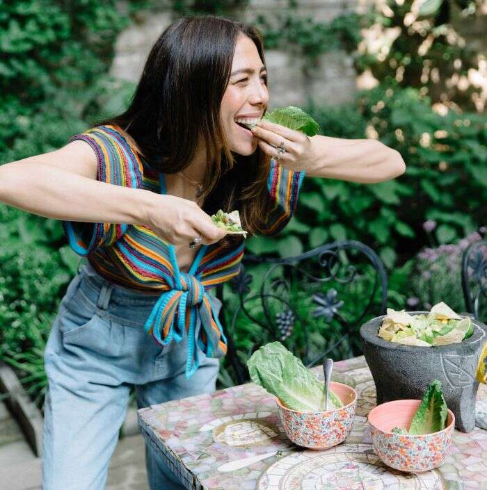 Nicole, founder of Bonberi eating salad