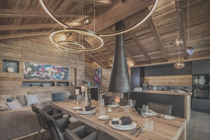 A dinning table set for a meal in in an Austrian Chalet