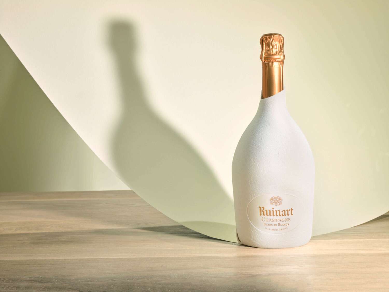 Ruinart bottle in sustainable Second Skin Packaging