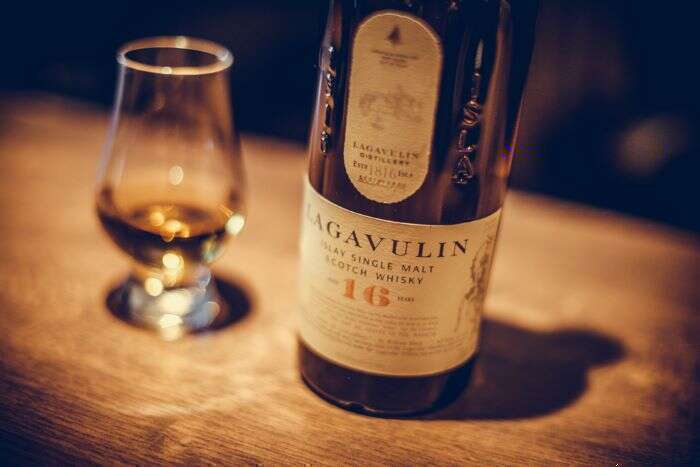 Lagavulin Scotch whisky bottle and dram