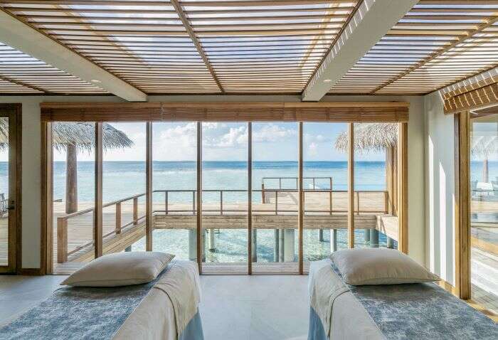 Two spa beds overlook the ocean 