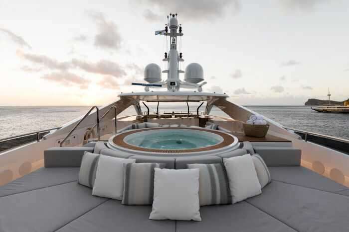 Hot tub and daybed on deck of superyacht