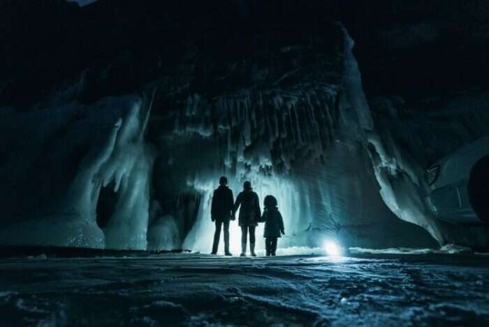 Family in Ice Cave - Family Vacation