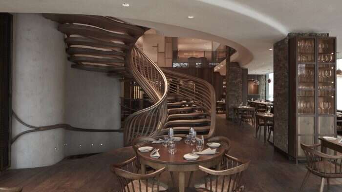 hide restaurant table and spiral staircase
