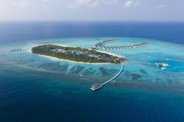 Mövenpick Resort Kuredhivaru Maldives aerial island shot