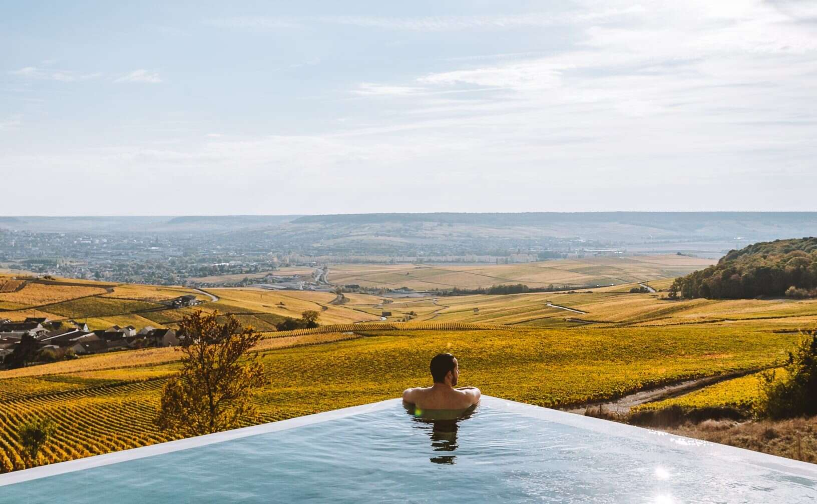 royal champagne hotel pool looking over vineyards