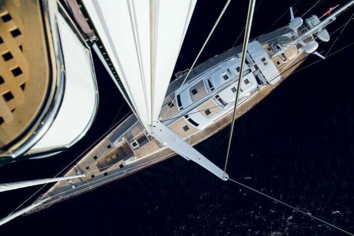 green sailing yacht