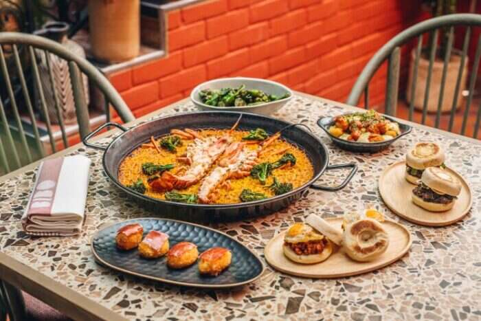 Plates of food on table on bibo terrace