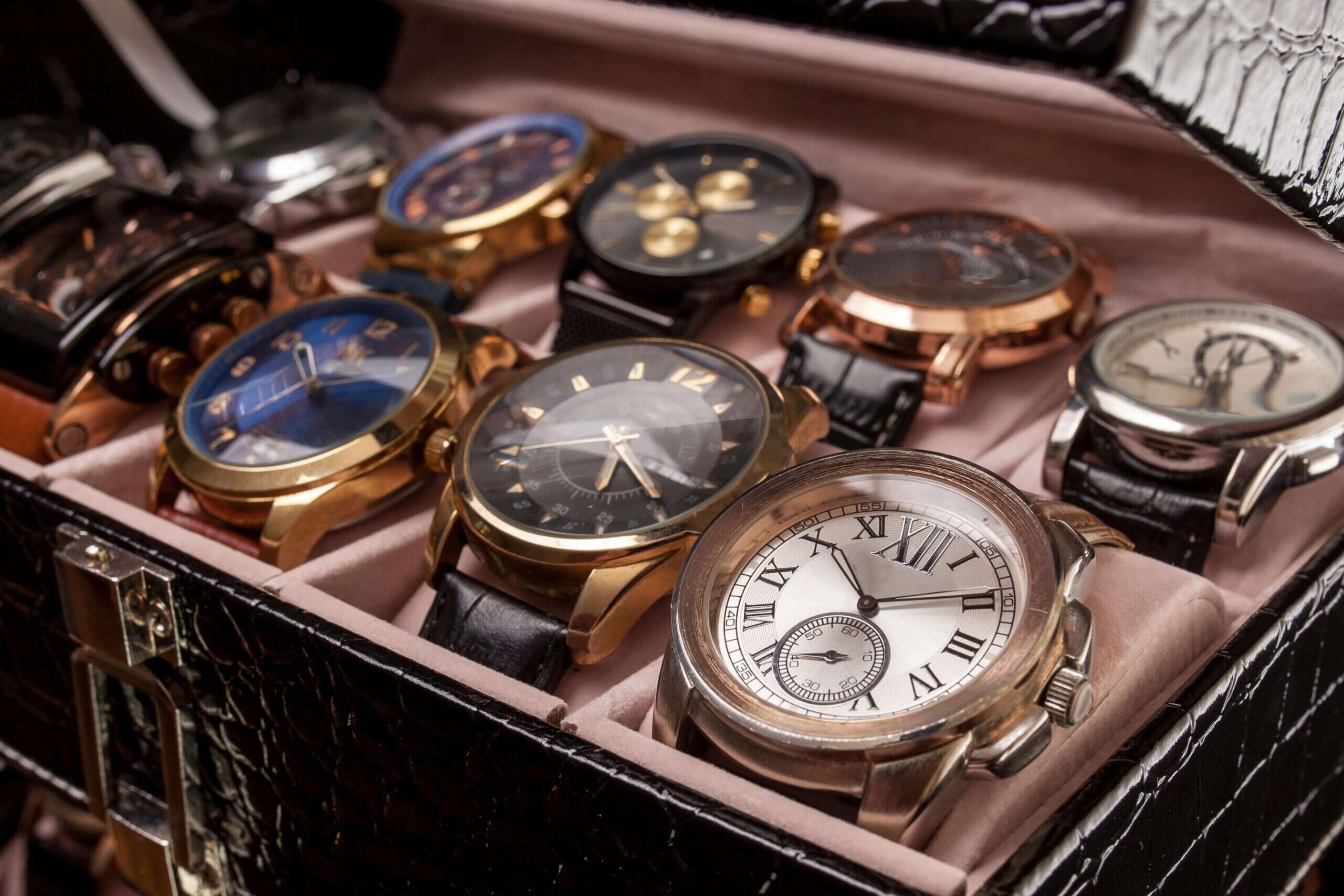luxury watch in box at auction