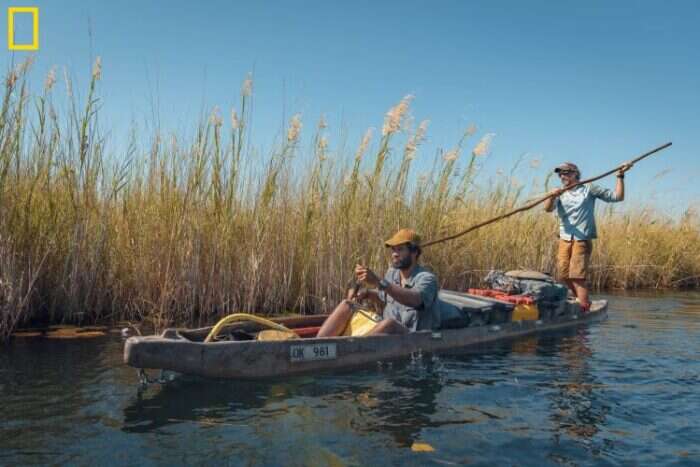 National Geographic researchers canoe through the delta