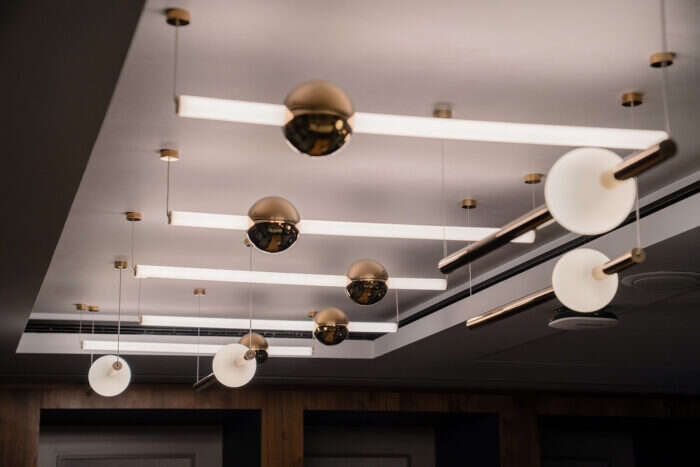Lights designed by Tom Dixon and Lee Broom at Centurion Lounge London Heathrow Airport
