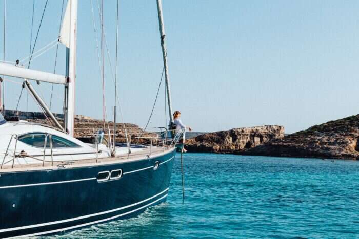 Woman on a yacht in the Blue Lagoon Malta 