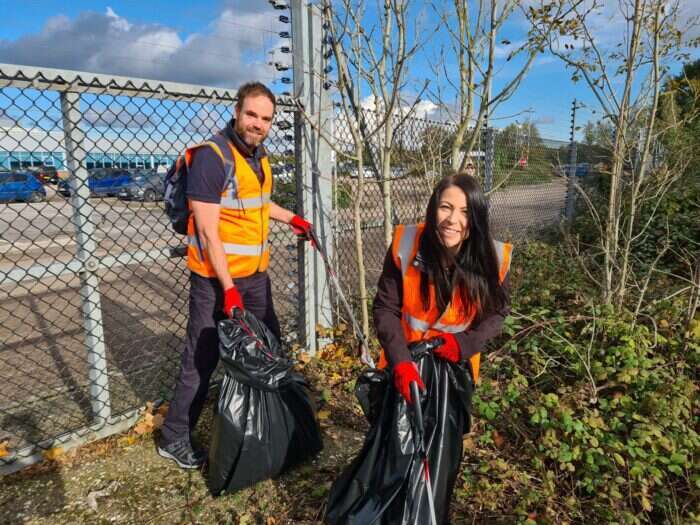 Greg Charman and Melissa McKinley litter picking at London Gatwick