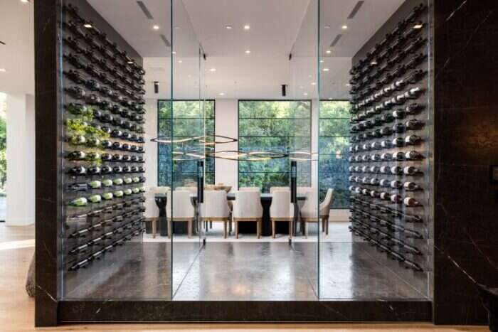 Glass climate controlled wine storage room off the dining area