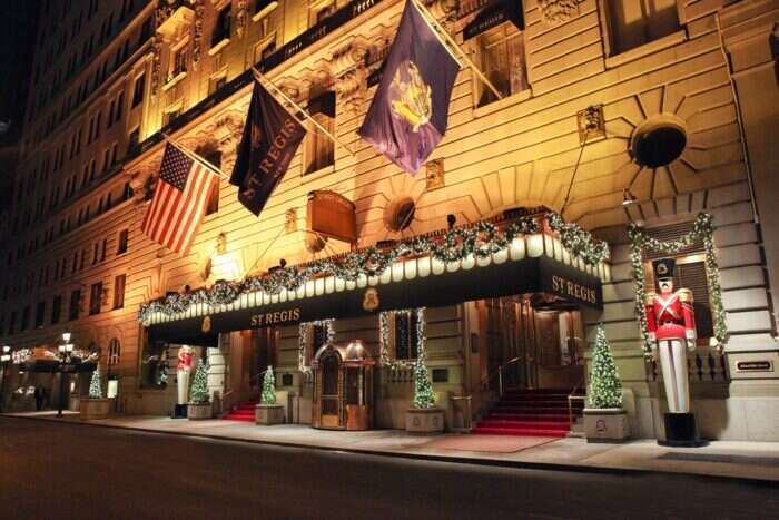 Exterior of the St. Regis New York with festive decorations