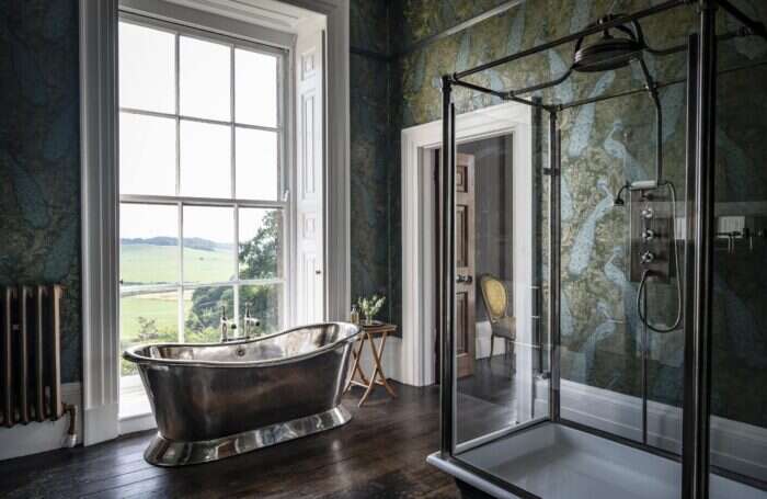 Bathroom with free standing tub and shower at Keythorpe Hall