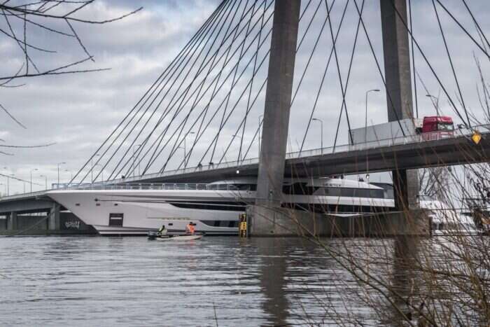 galactica yacht under bridge
