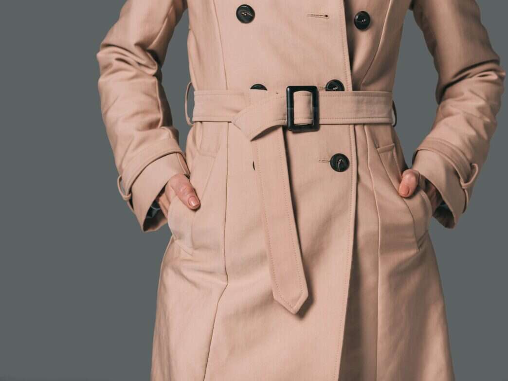 close up of burberry trench coat in spring capsule wardrobe