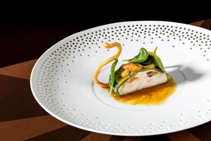 turbot and mussels dish by golvet restaurant