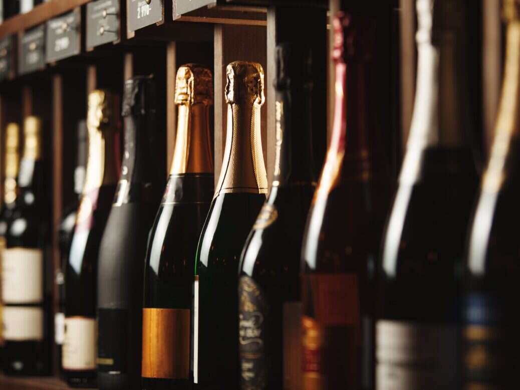 Champagne bottles on shelf