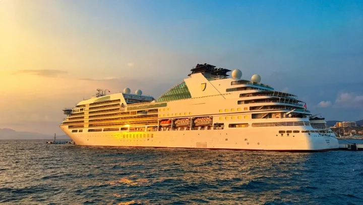 "SEABOURN ENCORE, Nassau" cruise ship at sunset in the harbor of Kusadasi, Aydin, Turkey