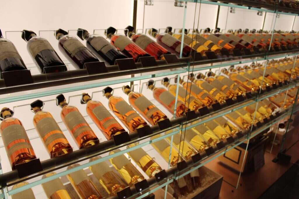 Chateau d'Yquem bottles on shelf 