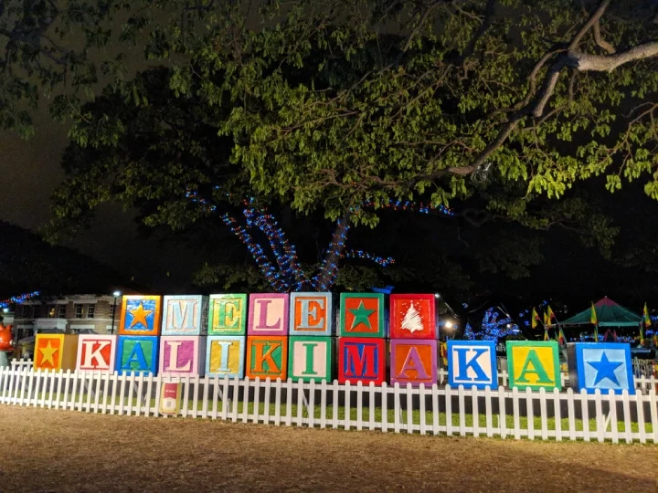 Mele Kalikimaka Sign Made of Wood Blocks on Display in front of Honolulu Hale, the Mayor Office, as part of Honolulu City Lights runs annually
