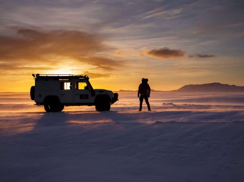 Man and car on ice