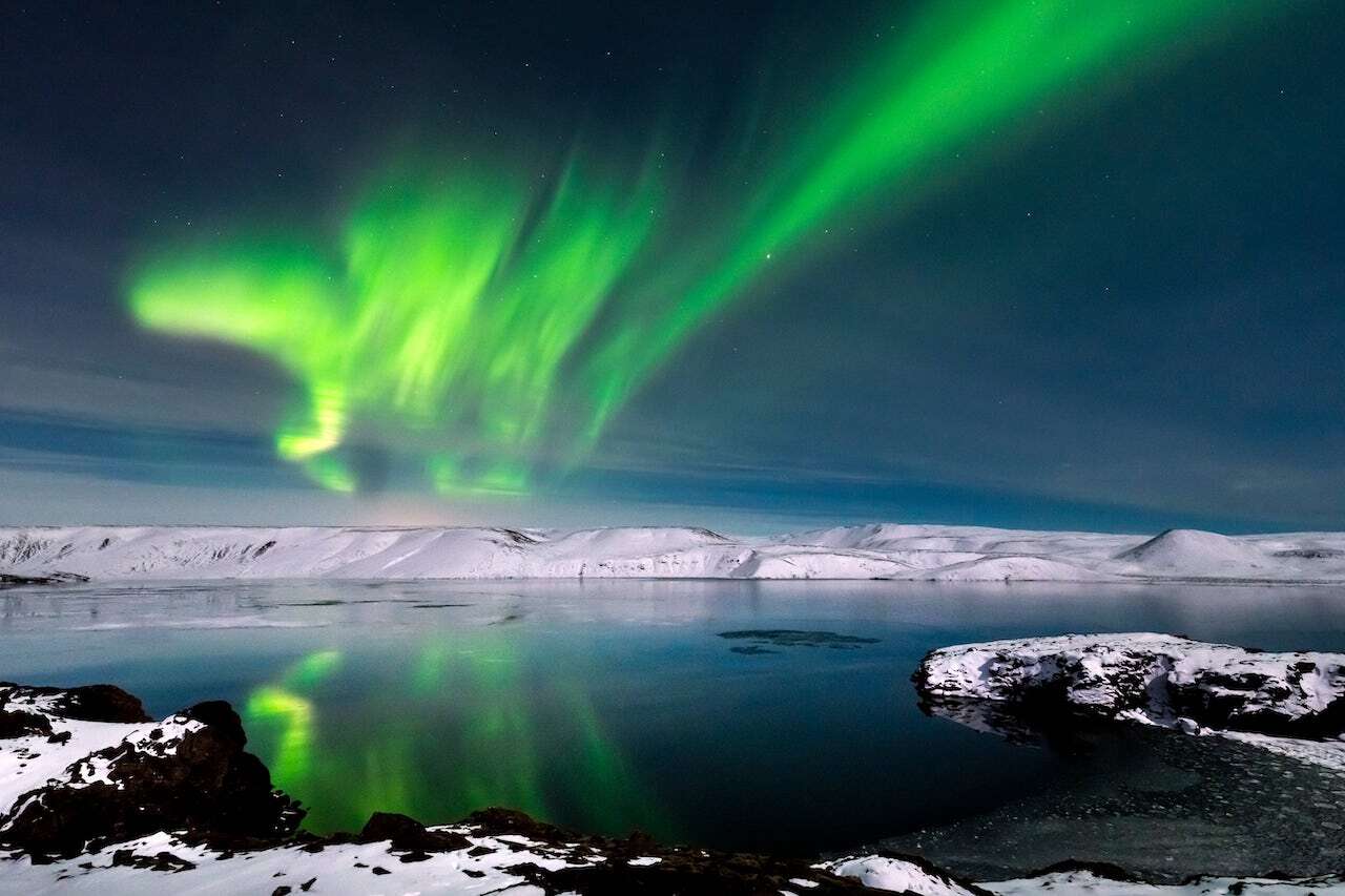 northern lights over water