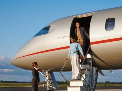 Couple departing off VistaJet ; How much does VistaJet cost