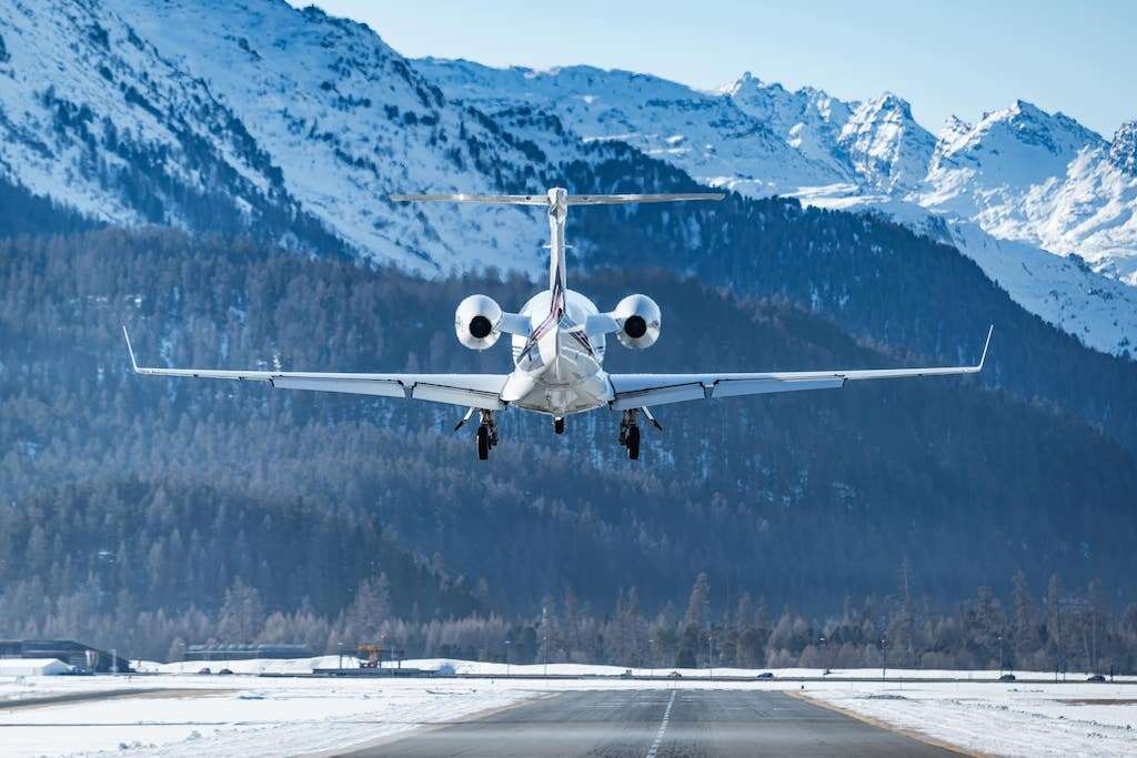 private jet landing in the snow