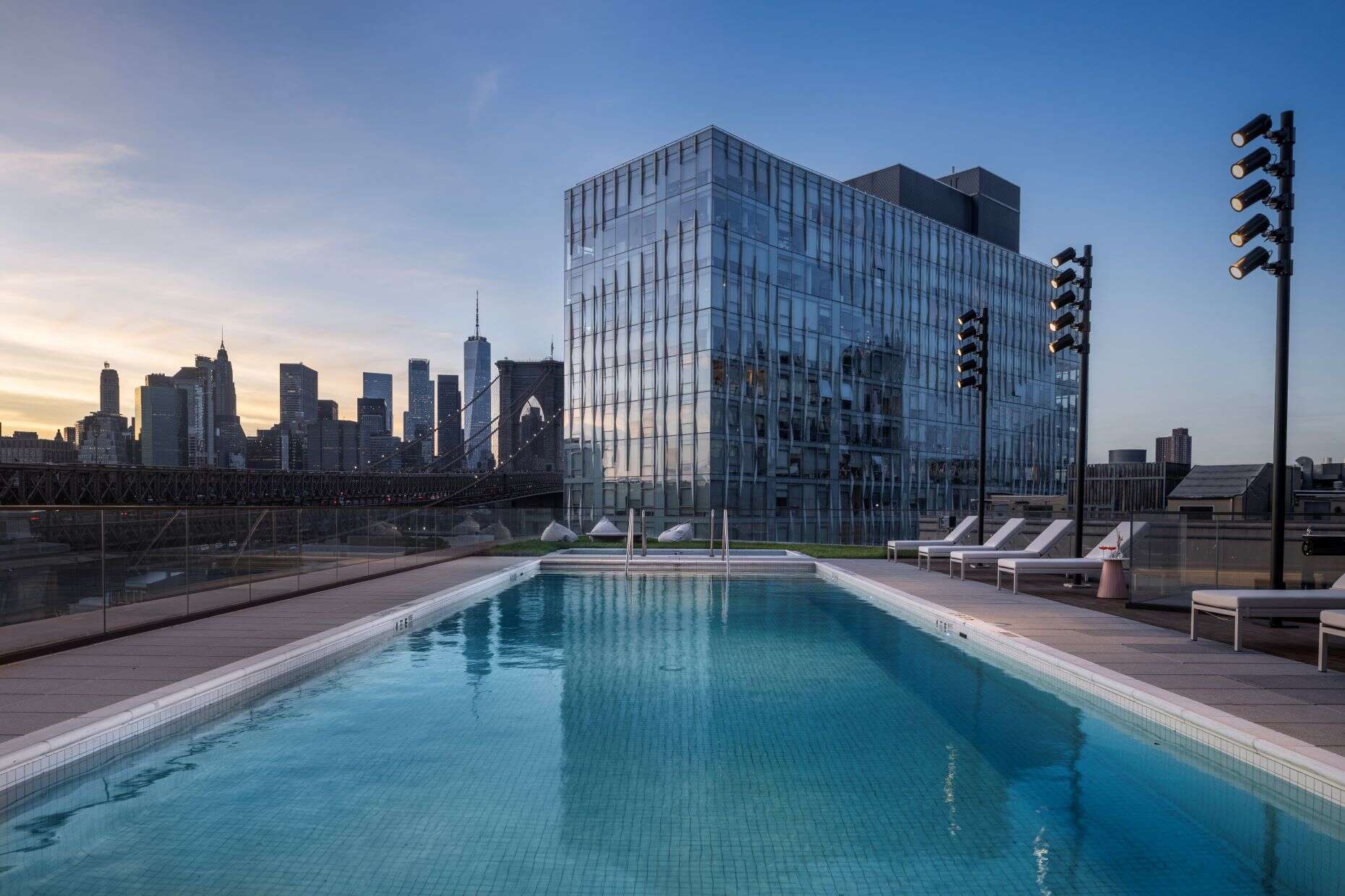 The outdoor swimming pool with views across Brooklyn