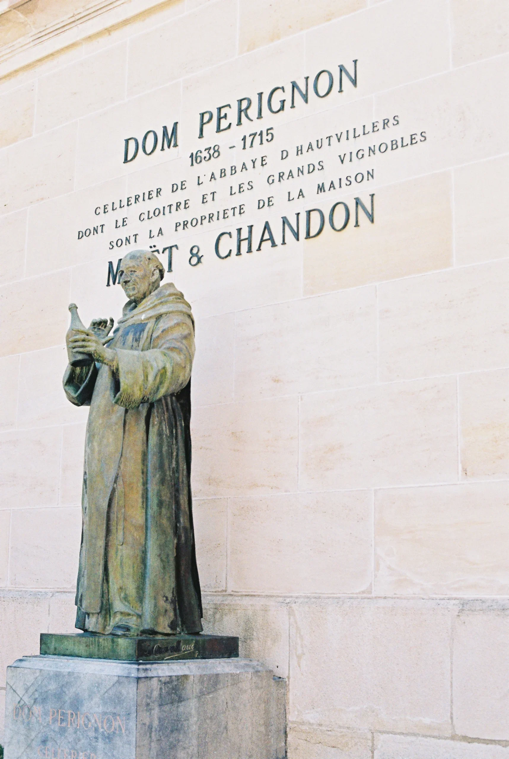 Dom Pérignon statue at the Maison ; luxury travel guide to Champagne