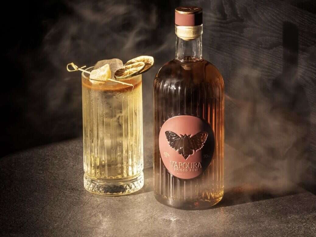 Vapoura rum cocktail and bottle