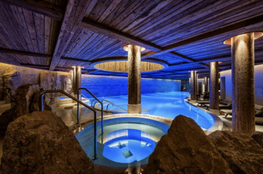 The blue salt grotto indoor pool at Alpina Gstaad.