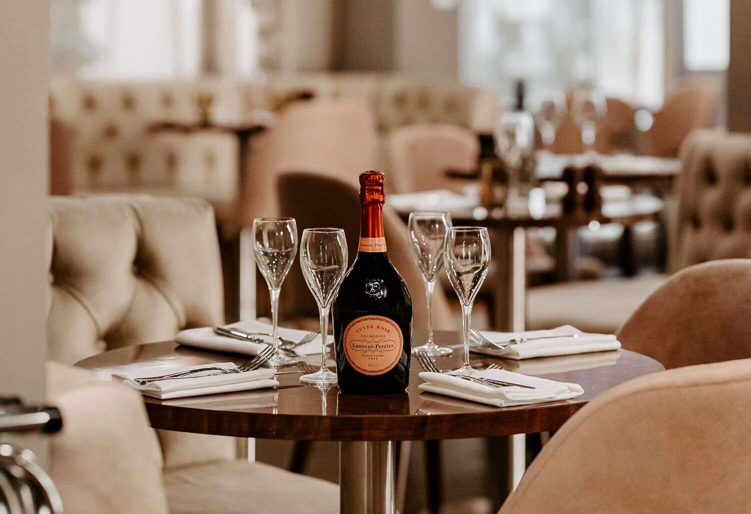 Laurent-Perrier Cuvée Rosé on table