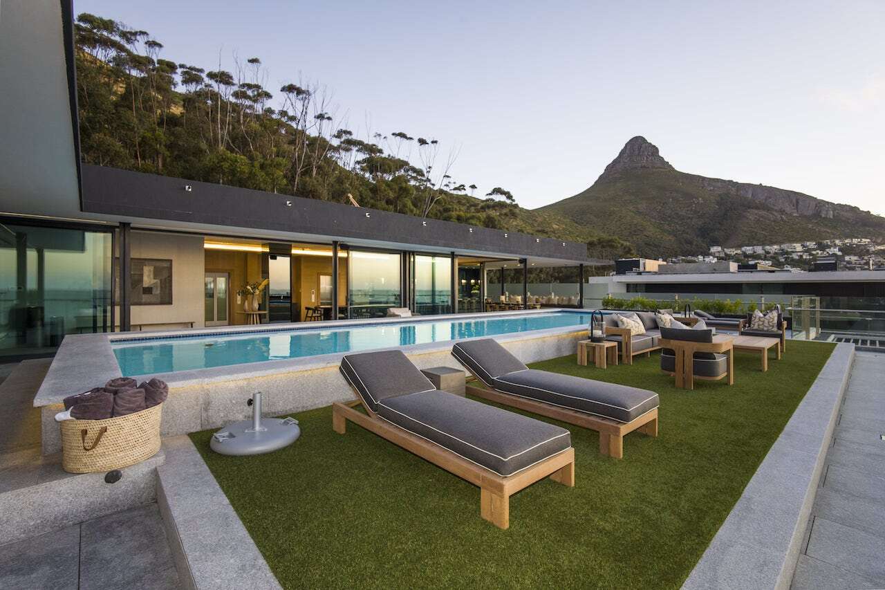 The outdoor spaces, overlooked by mountains. 