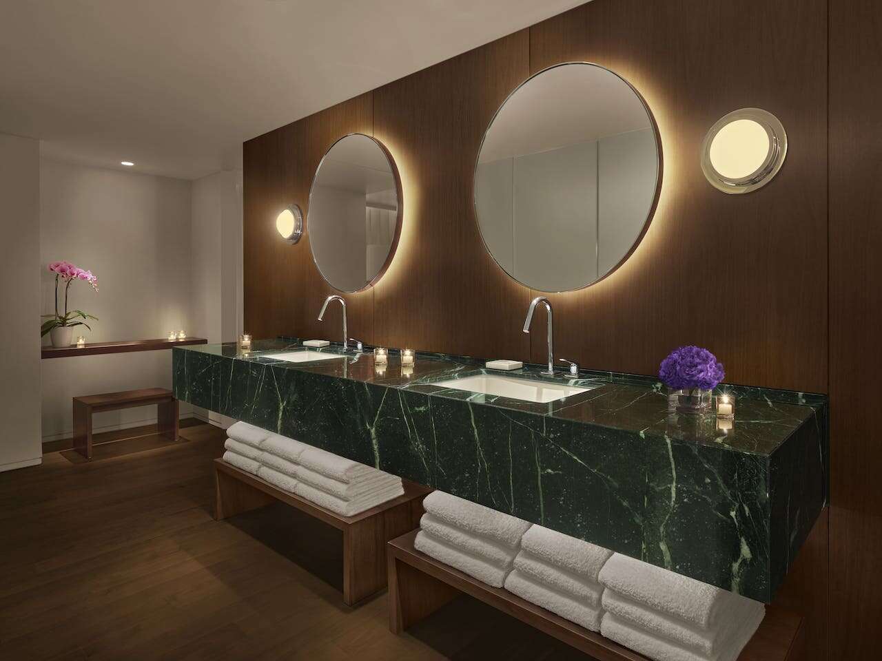 The Penthouse Suite's bathroom, featuring a signature green marble sink.