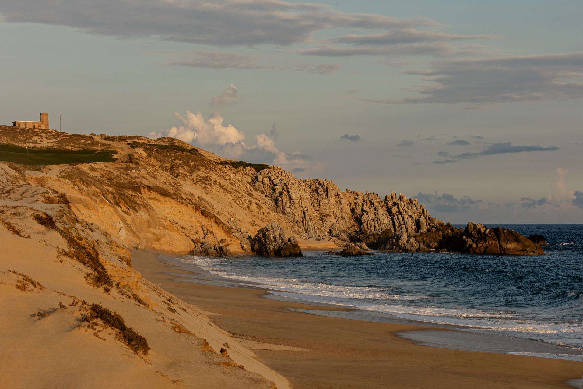 Image showing the Los Cabos landscape, with cliffs and a beach, at Rosewood Residences Old Lighthouse.