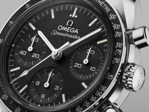 omega speedmaster 38 black dial